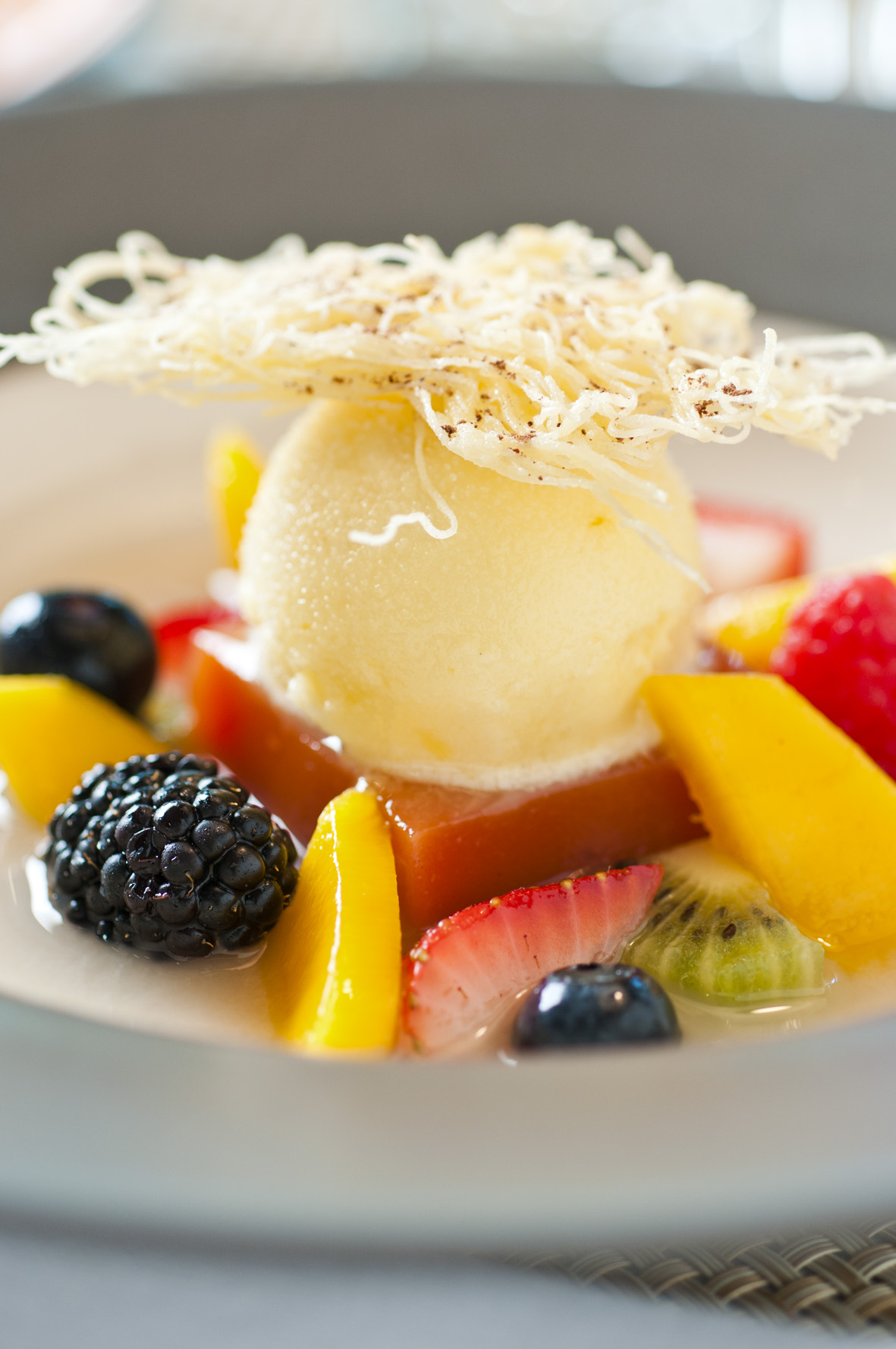 dessert-lychee-soup-with-summer-fruits-exotic-fruit-cube-and-orange-sherbet