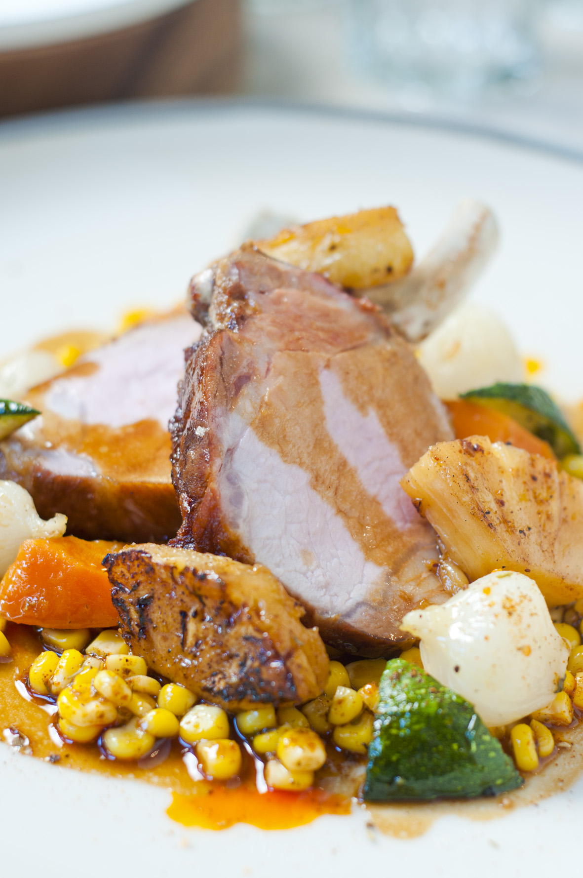 iberico-pork-chop-sauteed-corn-with-carrots-and-zucchini-caramelised-pineapple